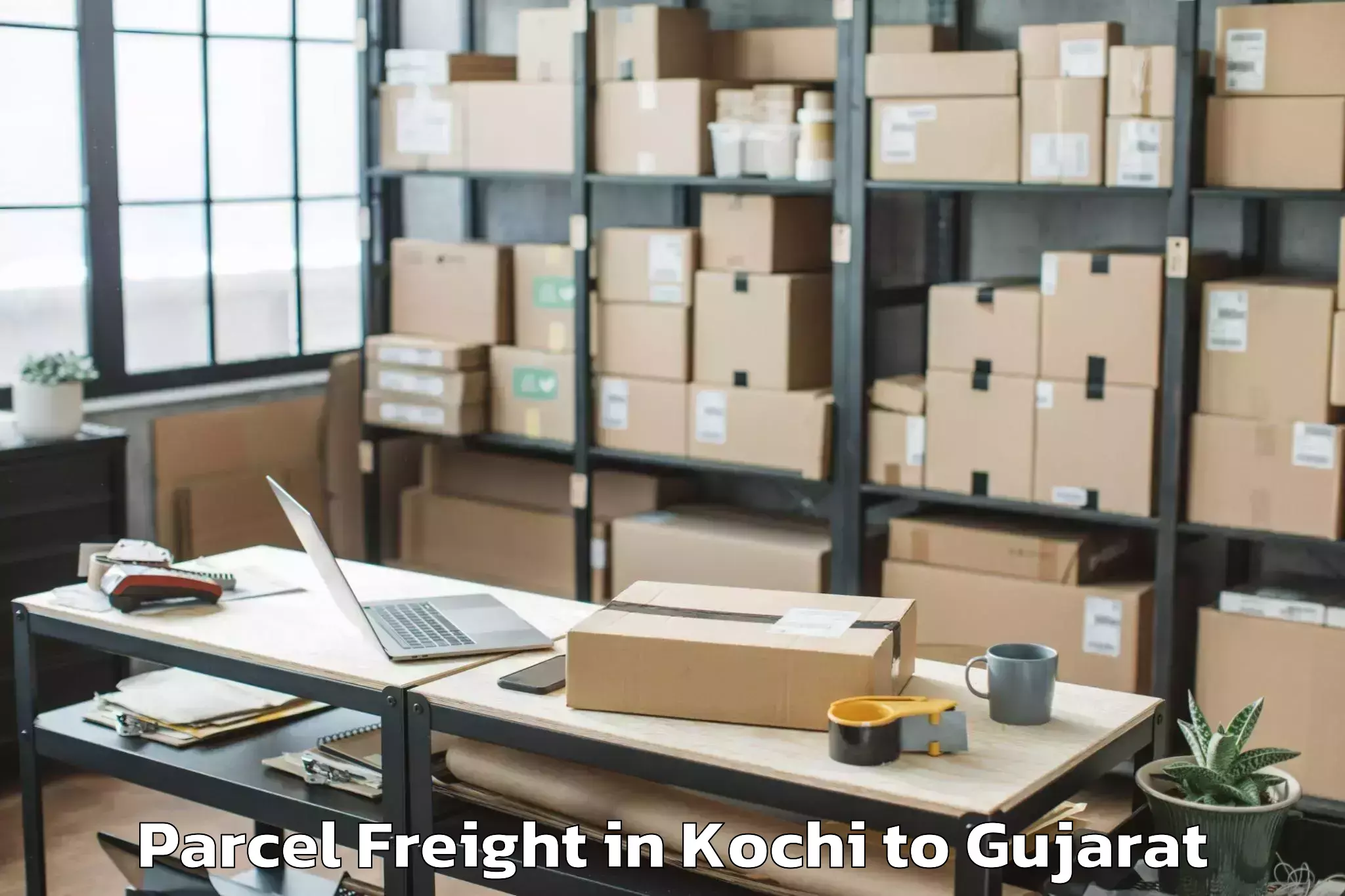 Easy Kochi to Crystal Mall Rajkot Parcel Freight Booking